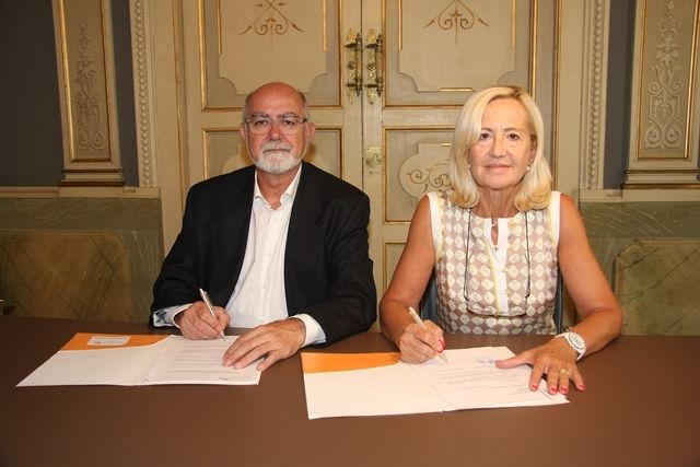 El COF de Valencia firma un convenio con Asindown